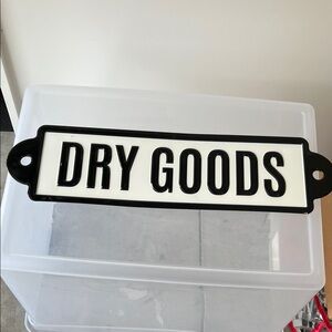 Metal Black and White Dry Goods Sign